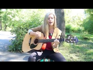 cute girl sings with a guitar beautiful voice cool song