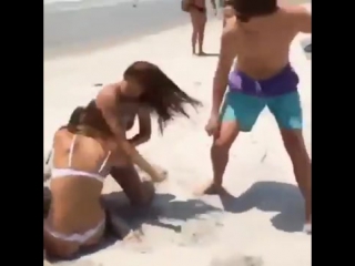 girls in bikinis fight on beach after one hooked up with her boyfriend